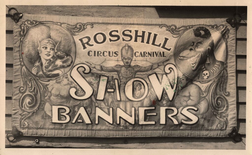 Photo of the Cad Hill Banner hanging in front of the Rosshill Studio. CA 1930